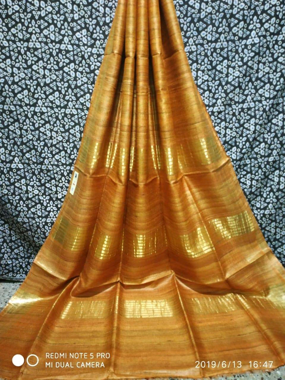 Vibrant yellow Tussar Ghicha silk saree with golden borders - Roomz