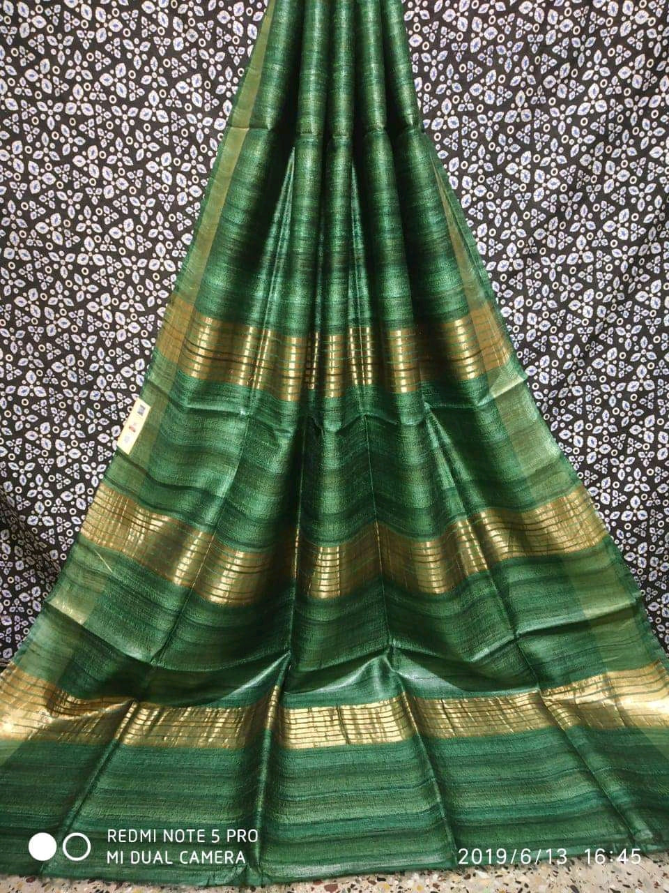Regal deep green Tussar Ghicha silk saree with golden borders - Roomz