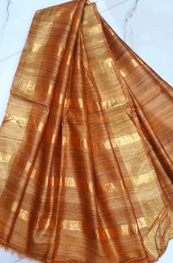 Handwoven rust Tussar Ghicha silk saree with golden zari border - Roomz