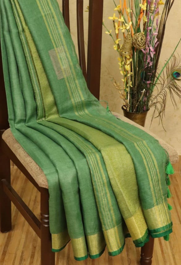 Green linen saree with golden zari border - Roomz Luxury Collection