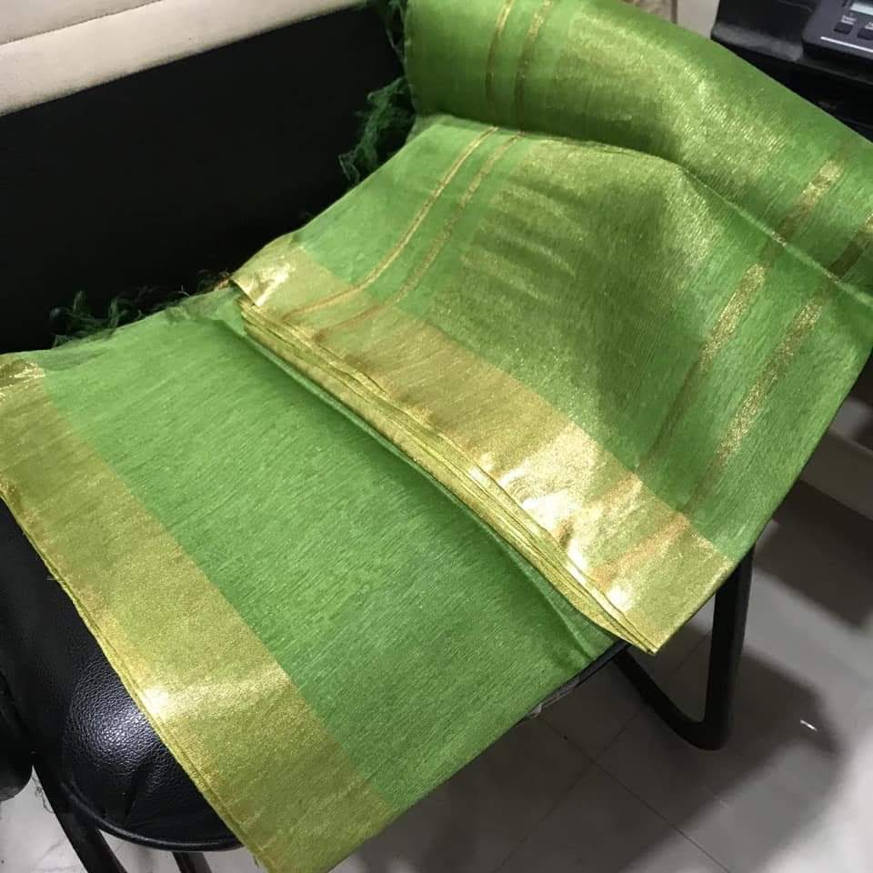 Stylish green saree with golden zari work for weddings, festive occasions, and parties