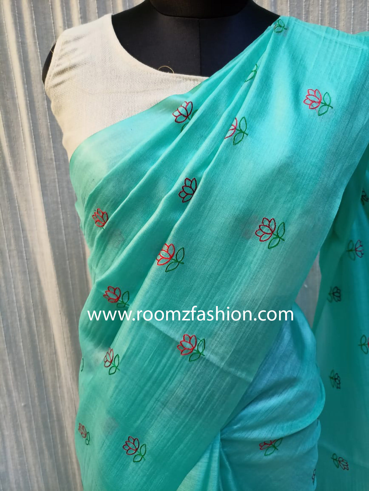 Close-up of handloom texture on green Tussar silk