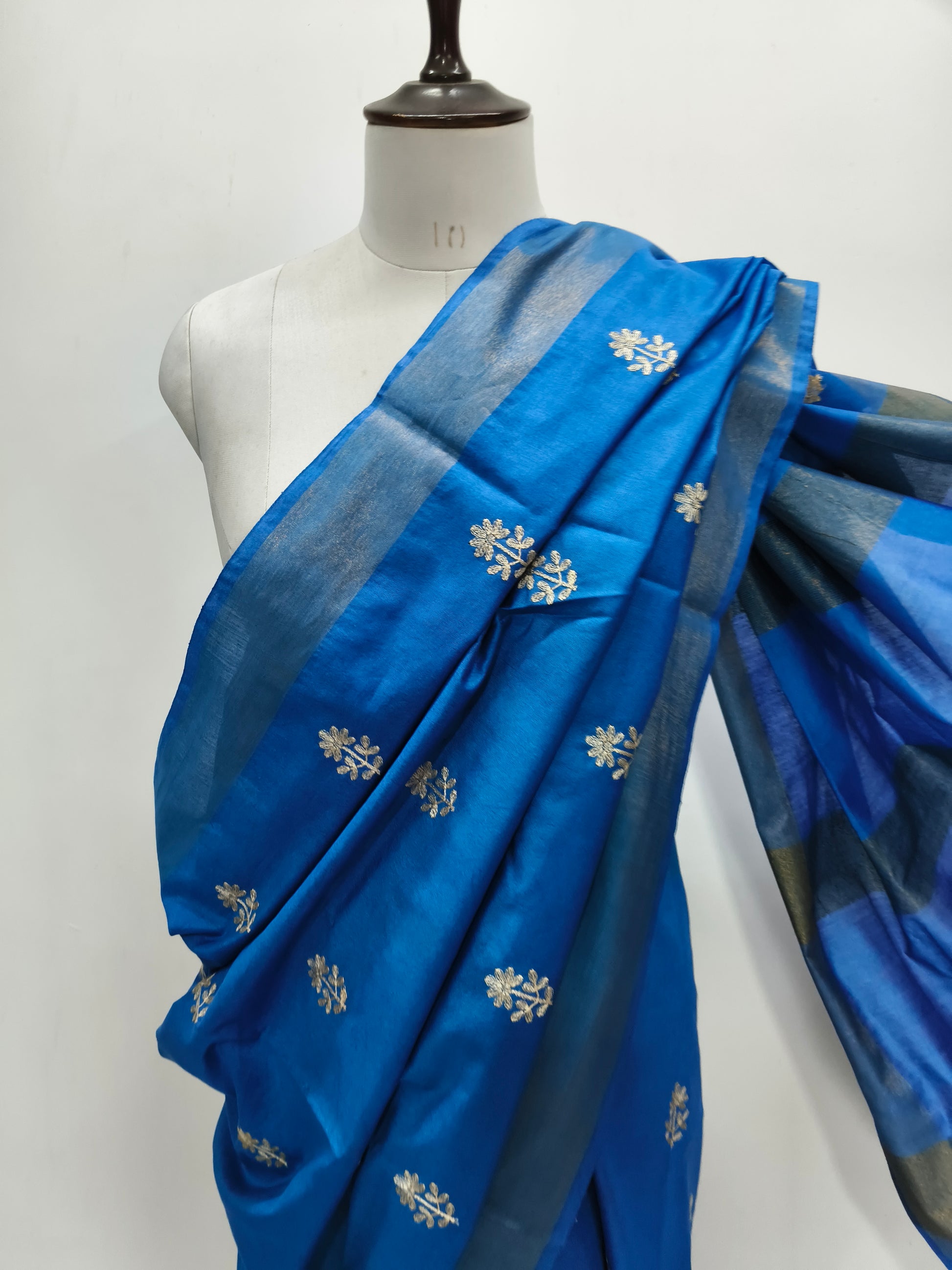 Close-up of embroidery detail on blue Kota Viscose saree - Roomz Fashion