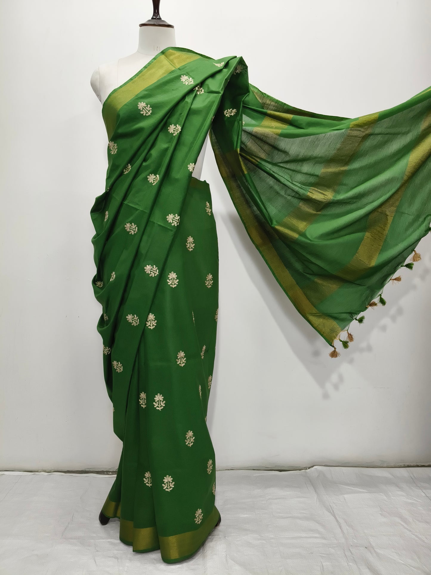 Close-up of embroidery detail on green Kota Viscose saree - Roomz Fashion