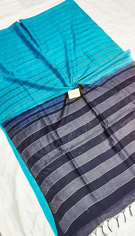 Close-up of weaving texture on turquoise Organza Viscose saree - Roomz Fashion