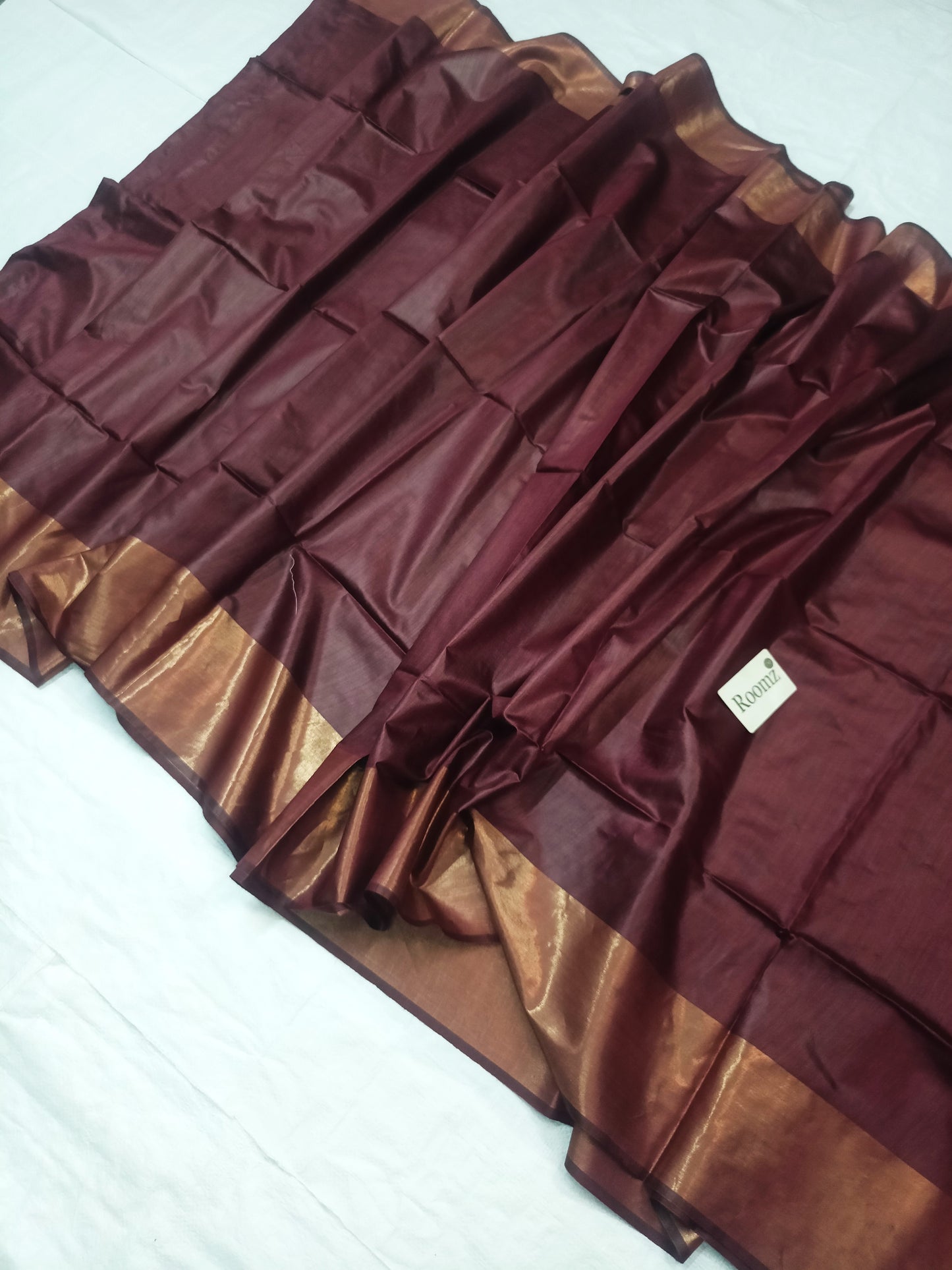 Draped brown Tussar silk saree showing elegant fall - Roomz Collection