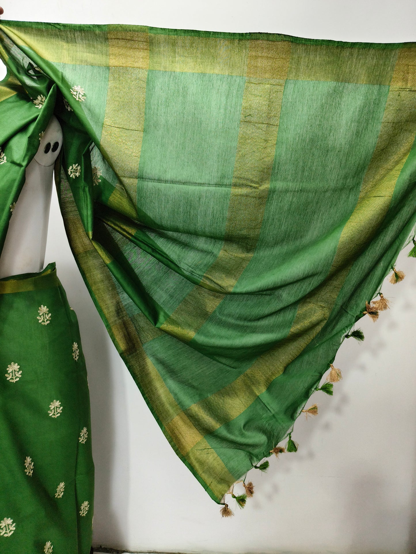 Draped green Kota Viscose saree showing elegant fall - Roomz Collection