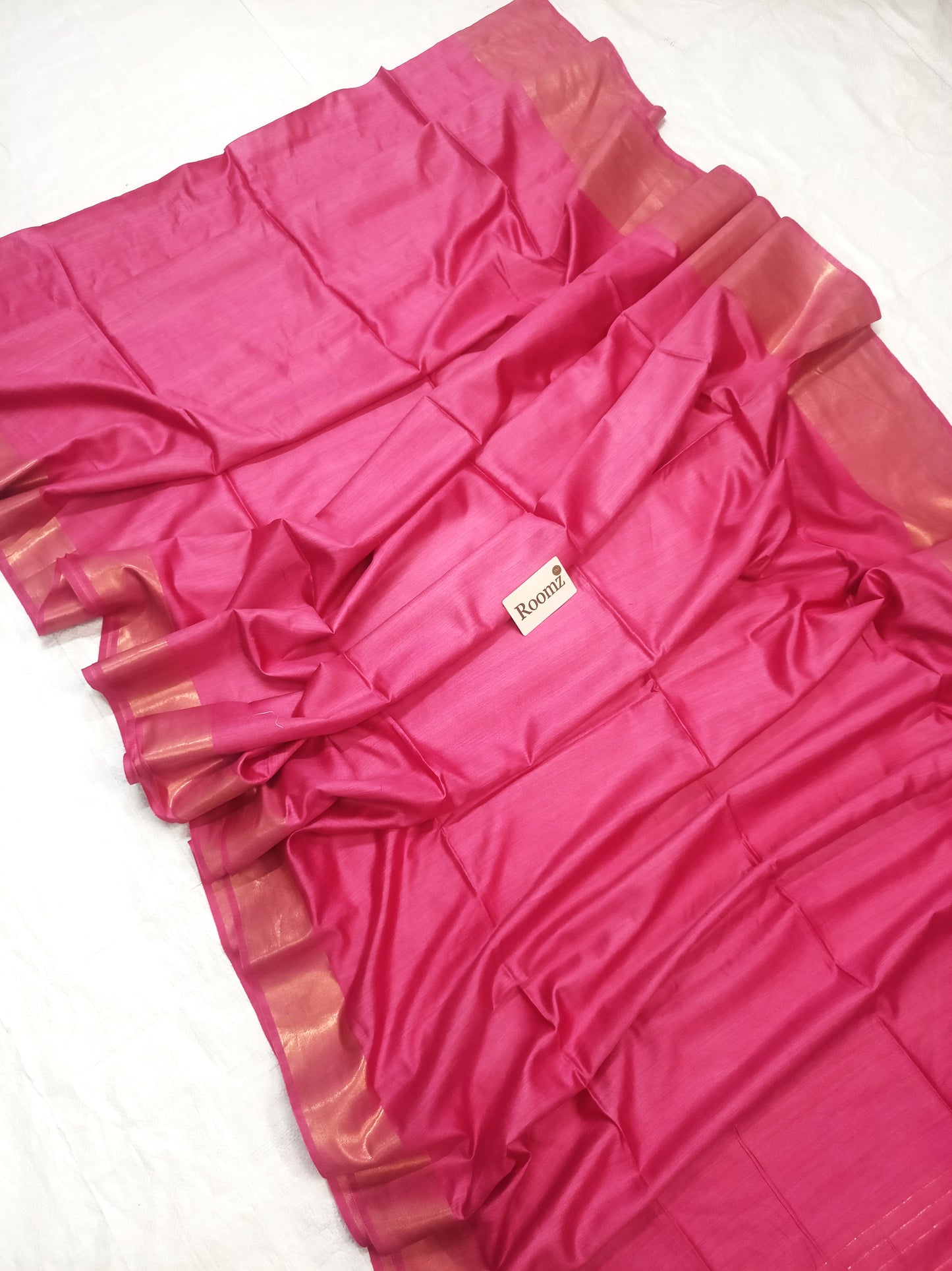 Draped soft pink Tussar silk saree showing elegant fall