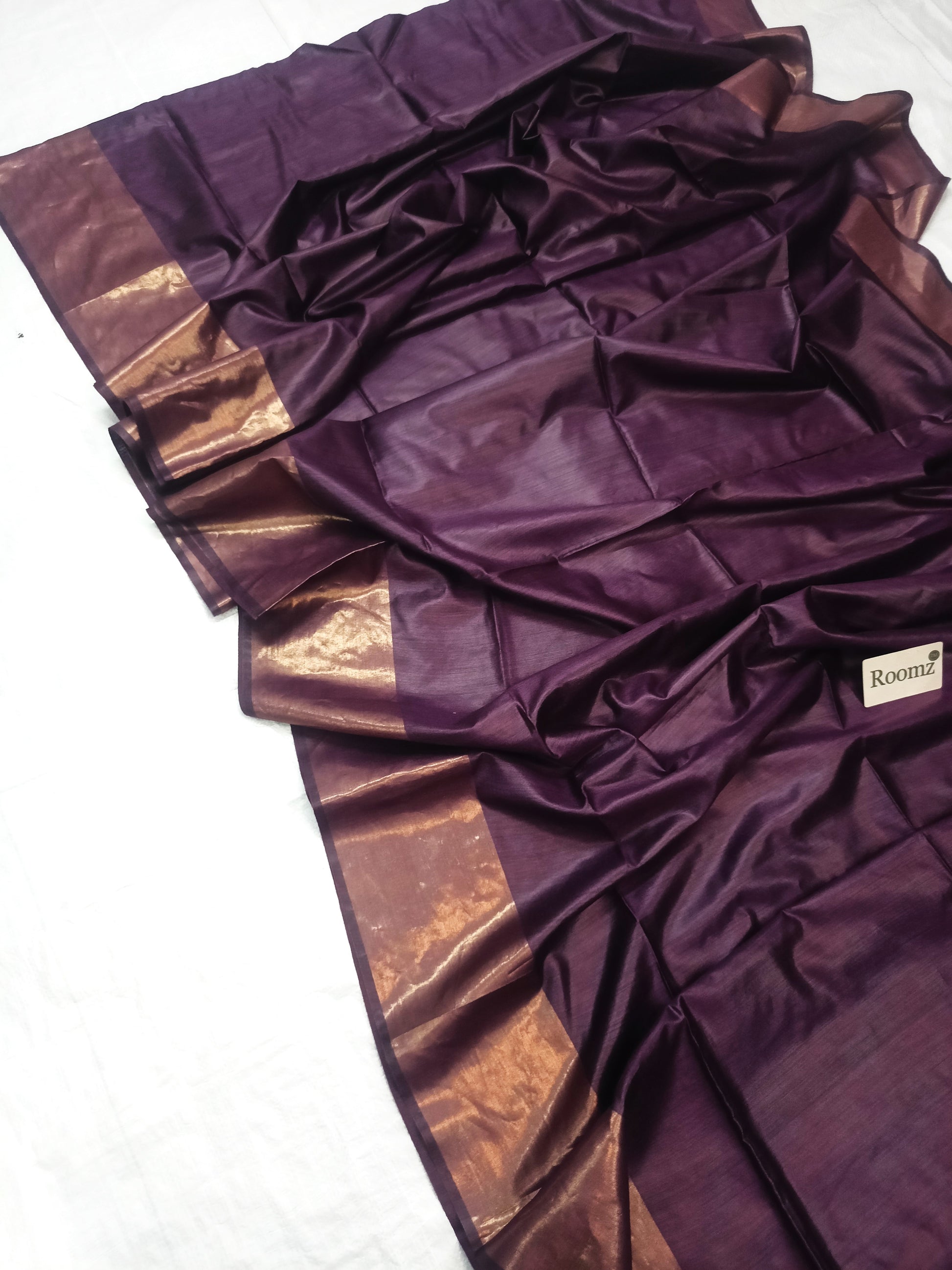 Draped wine red silk saree showing elegant fall - Roomz Collection