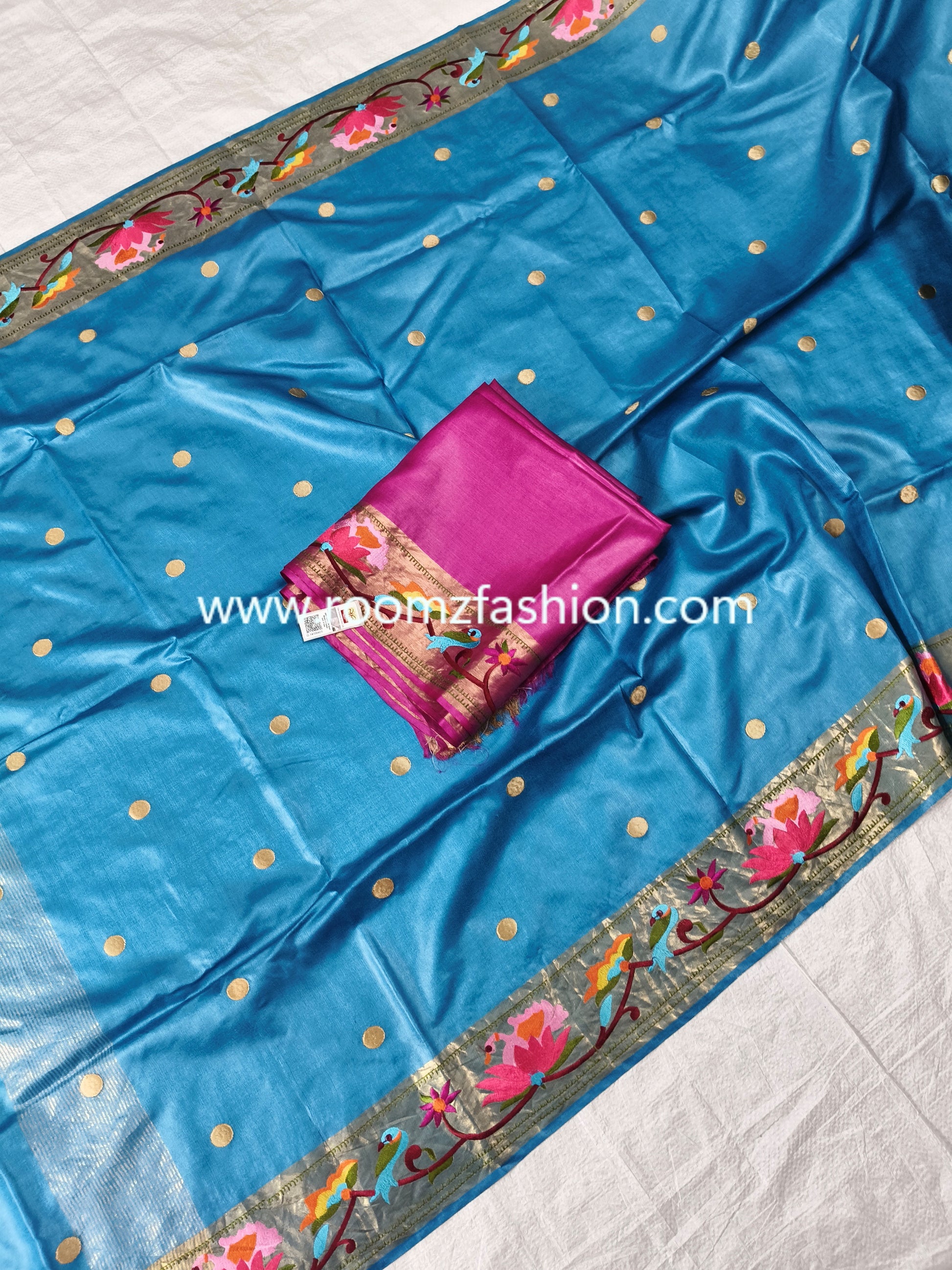 Handloom Blue Tussar Silk Saree featuring traditional embroidery design