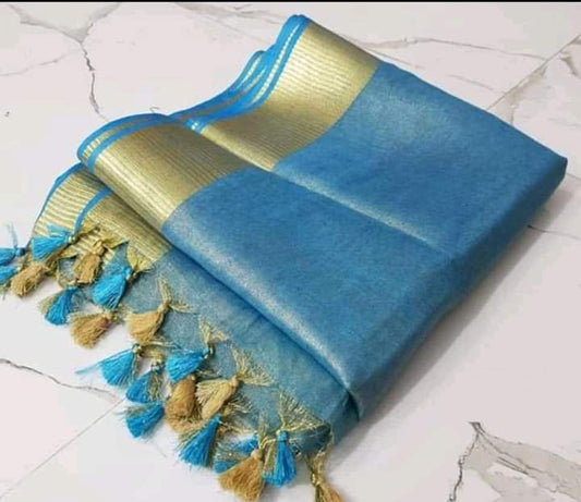 Turquoise tissue linen saree with golden zari border draped elegantly