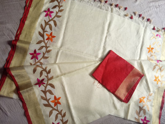 Off-white linen saree with golden zari border and red piping - Roomz Bridal Collection