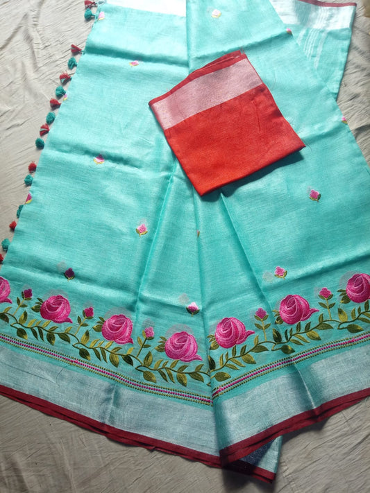 Pastel green linen saree with silver zari border and red piping - Roomz Bridal Collection