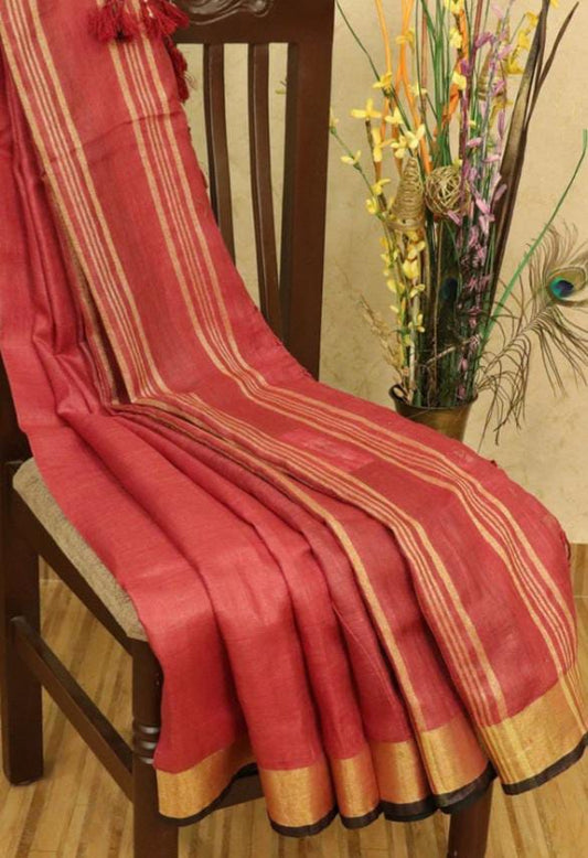 Red linen saree with golden zari border and black piping - Roomz Bridal Collection