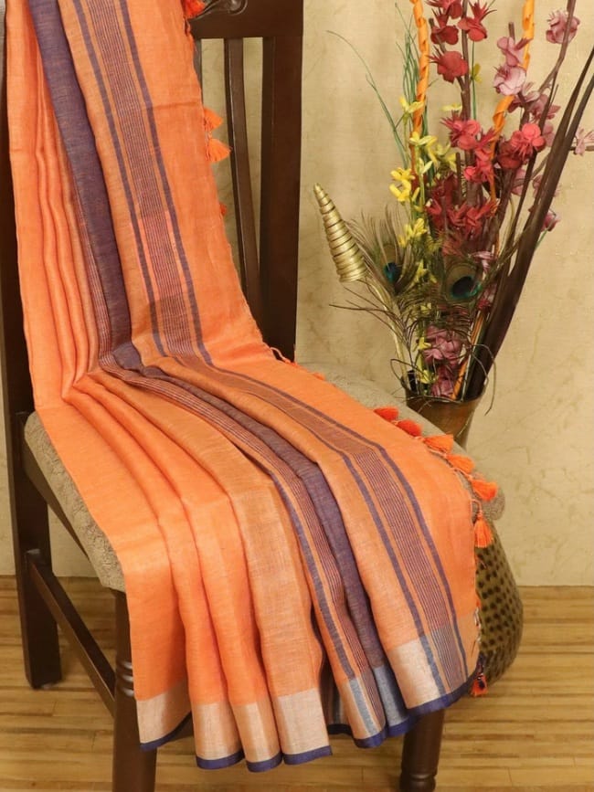 Orange linen saree with silver zari border and blue piping - Roomz Festive Collection