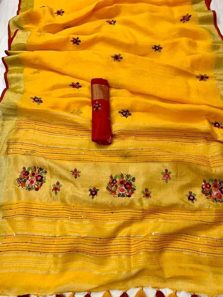 Light orange linen saree with golden border draped elegantly