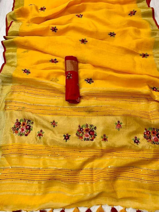 Light orange linen saree with golden border draped elegantly