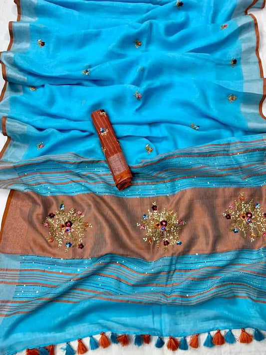 Firoza color linen saree with silver-zari and orange border draped elegantly