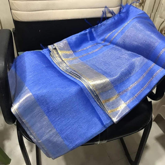 Royal blue silk linen saree with golden zari border draped elegantly