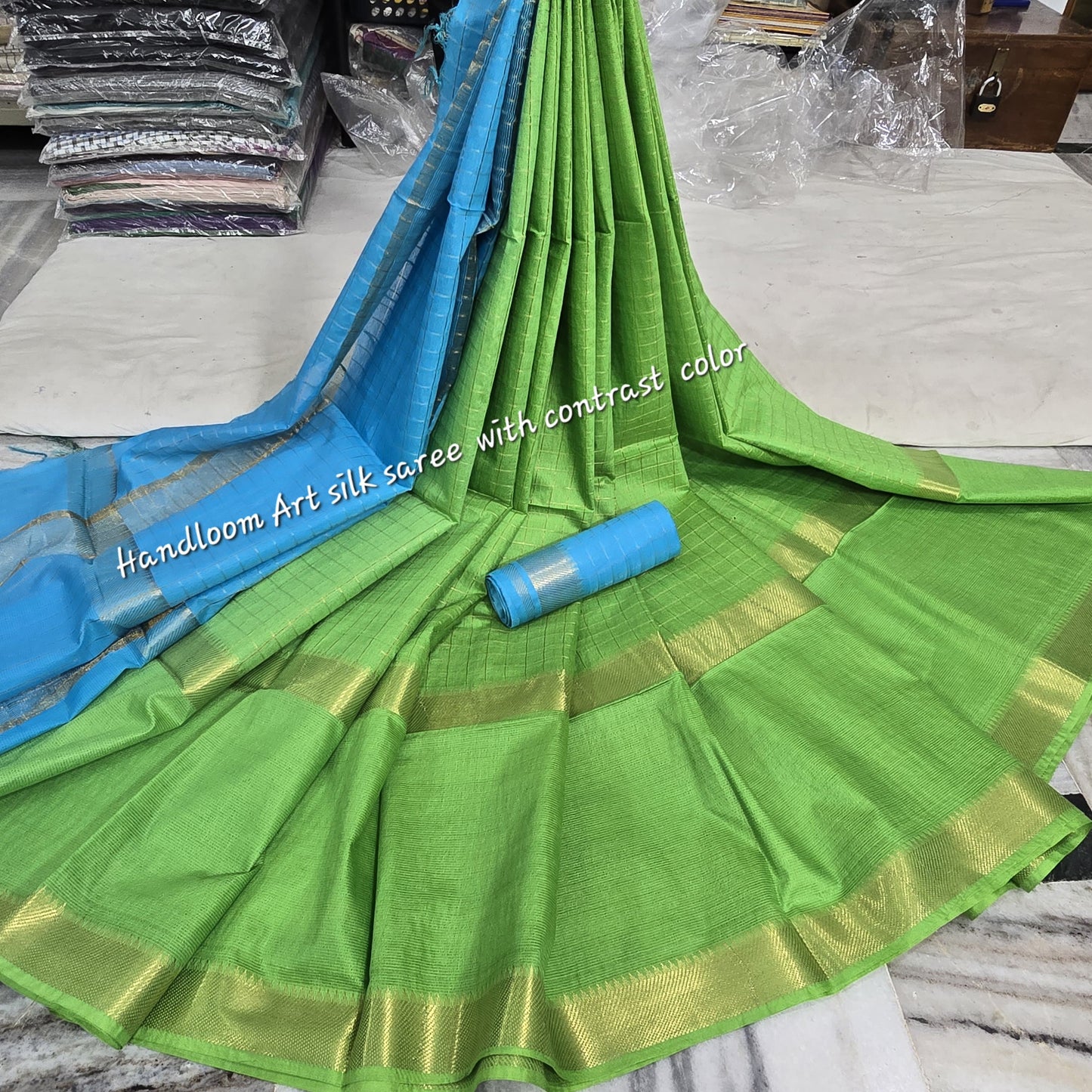 Turquoise blouse with golden border