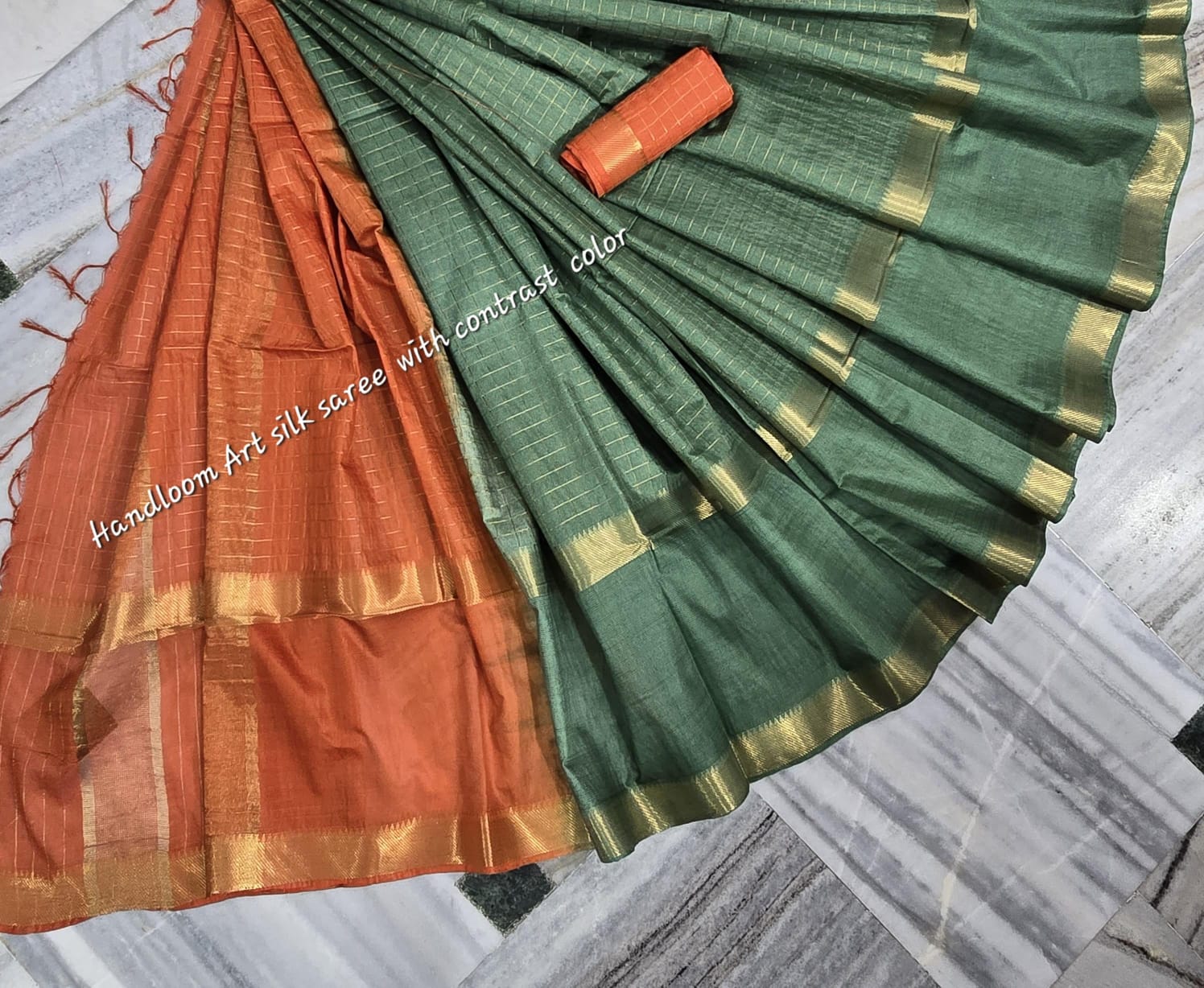 Zari wave pallu design on orange section saree