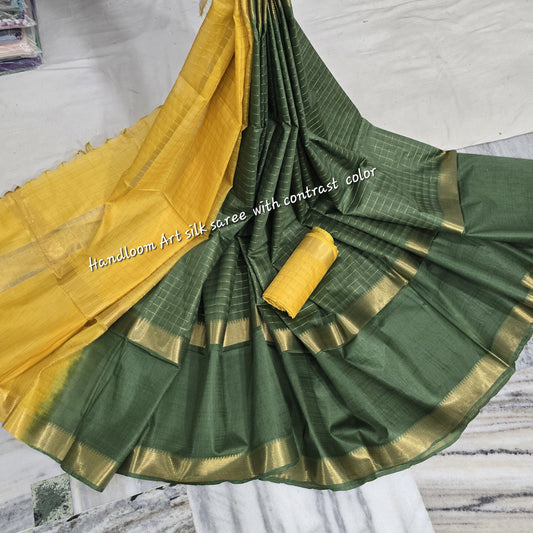 Green-yellow dual-tone Soft silk saree with golden zari border draped elegantly