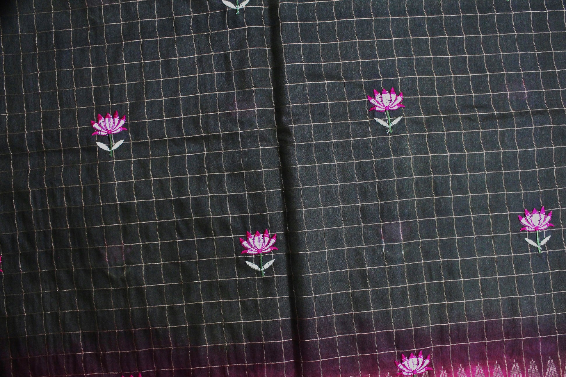Close-up of pink-green transition with embroidery