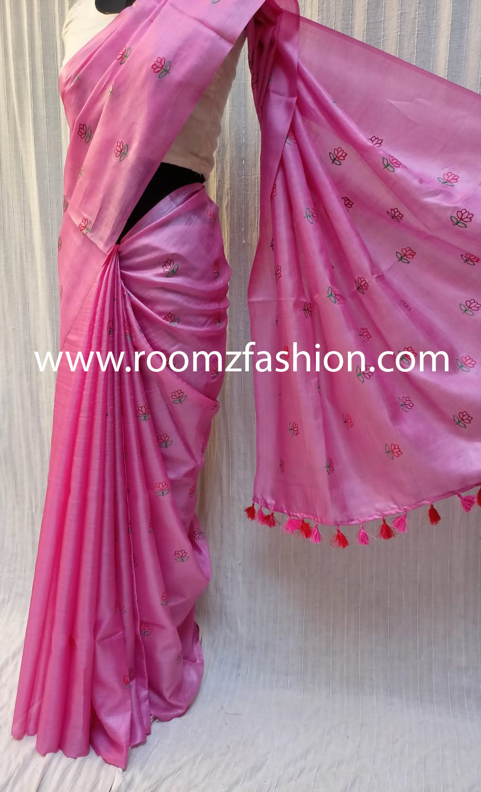 Close-up of handloom texture on orange Tussar silk