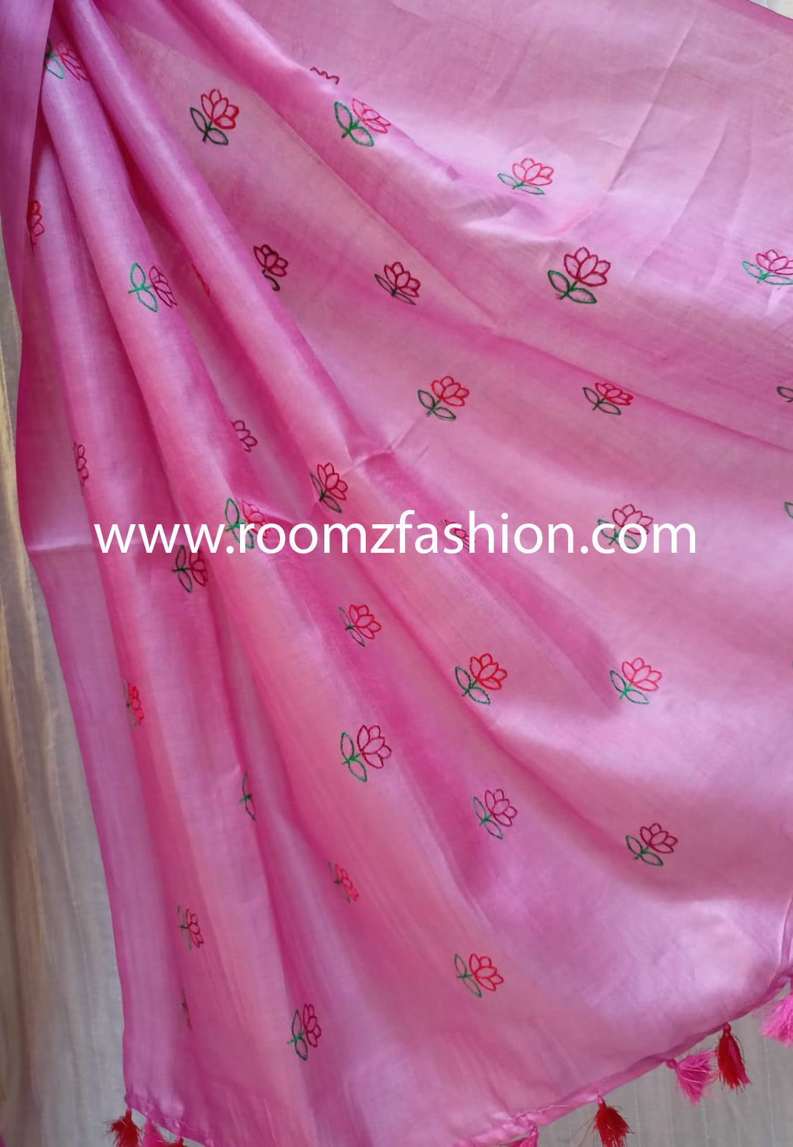 Hand-stitched floral embroidery detail