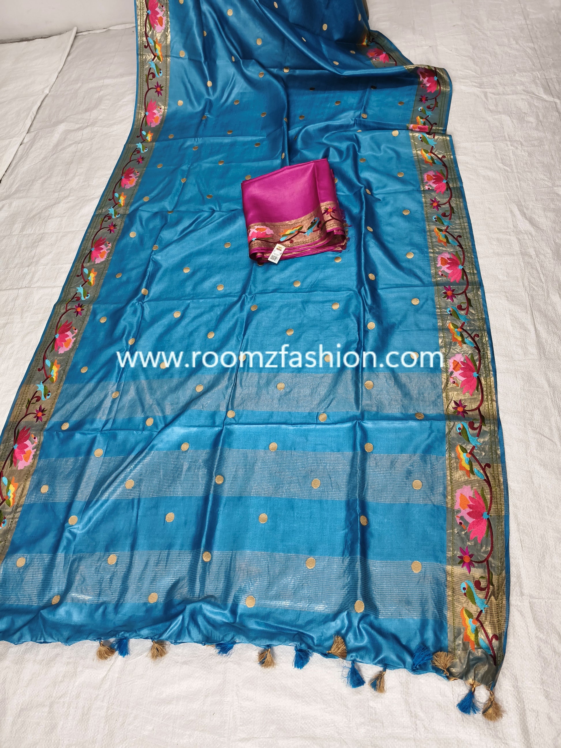 Traditional Indian Tussar Silk Saree with embroidered border and tassel finish