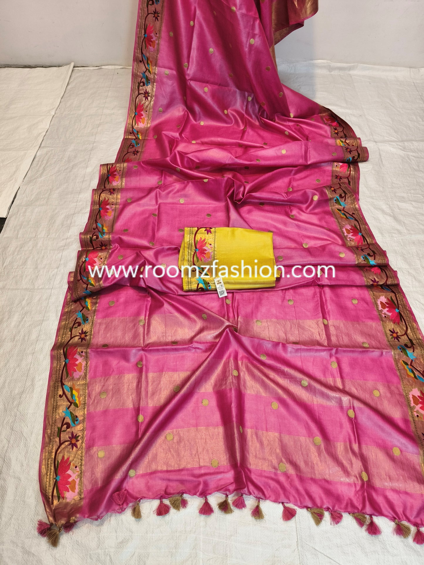 Traditional Pink Tussar Silk Saree with embroidery work and tassel detailing