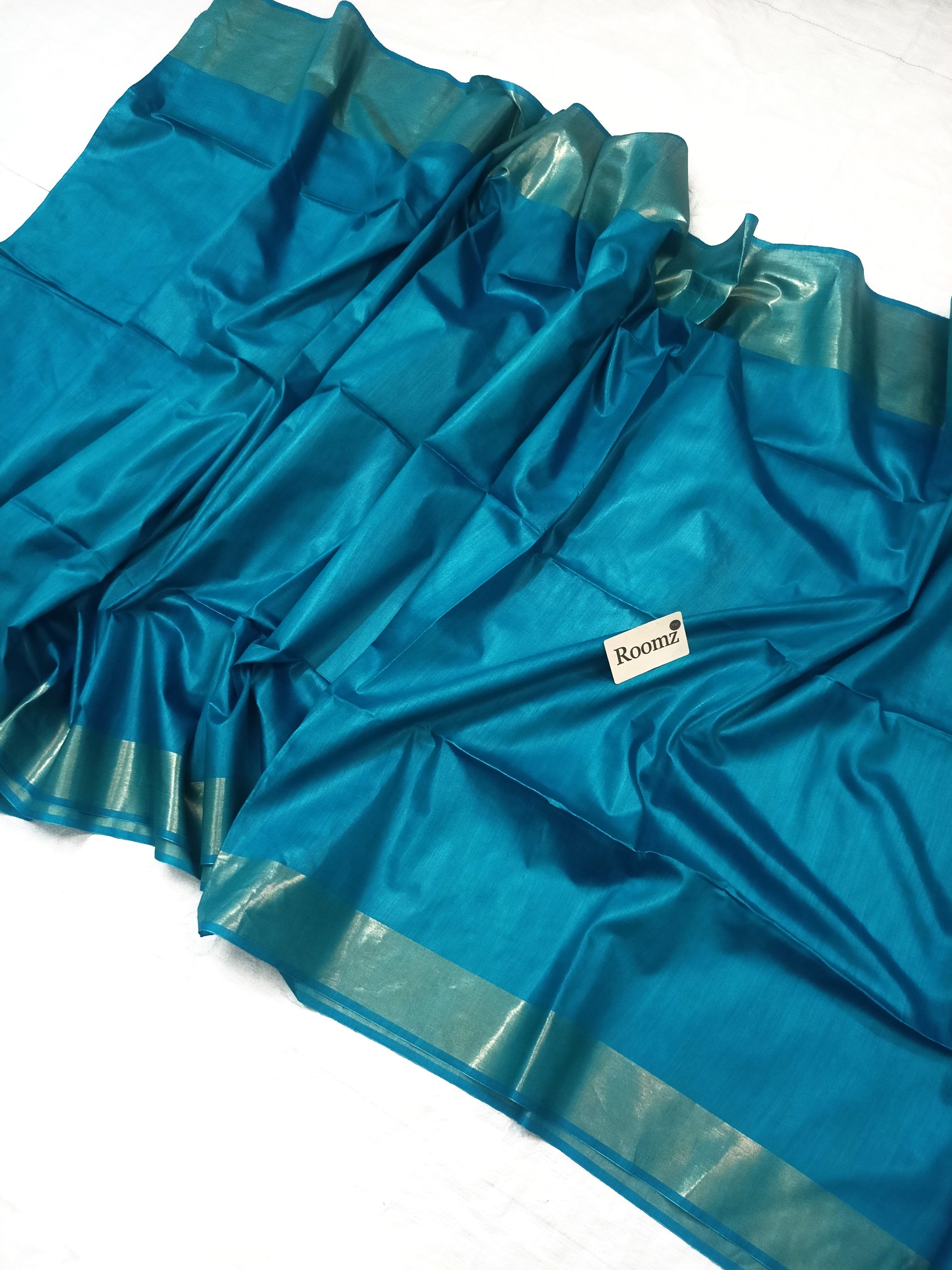 Turquoise Tussar silk saree with matching blouse piece